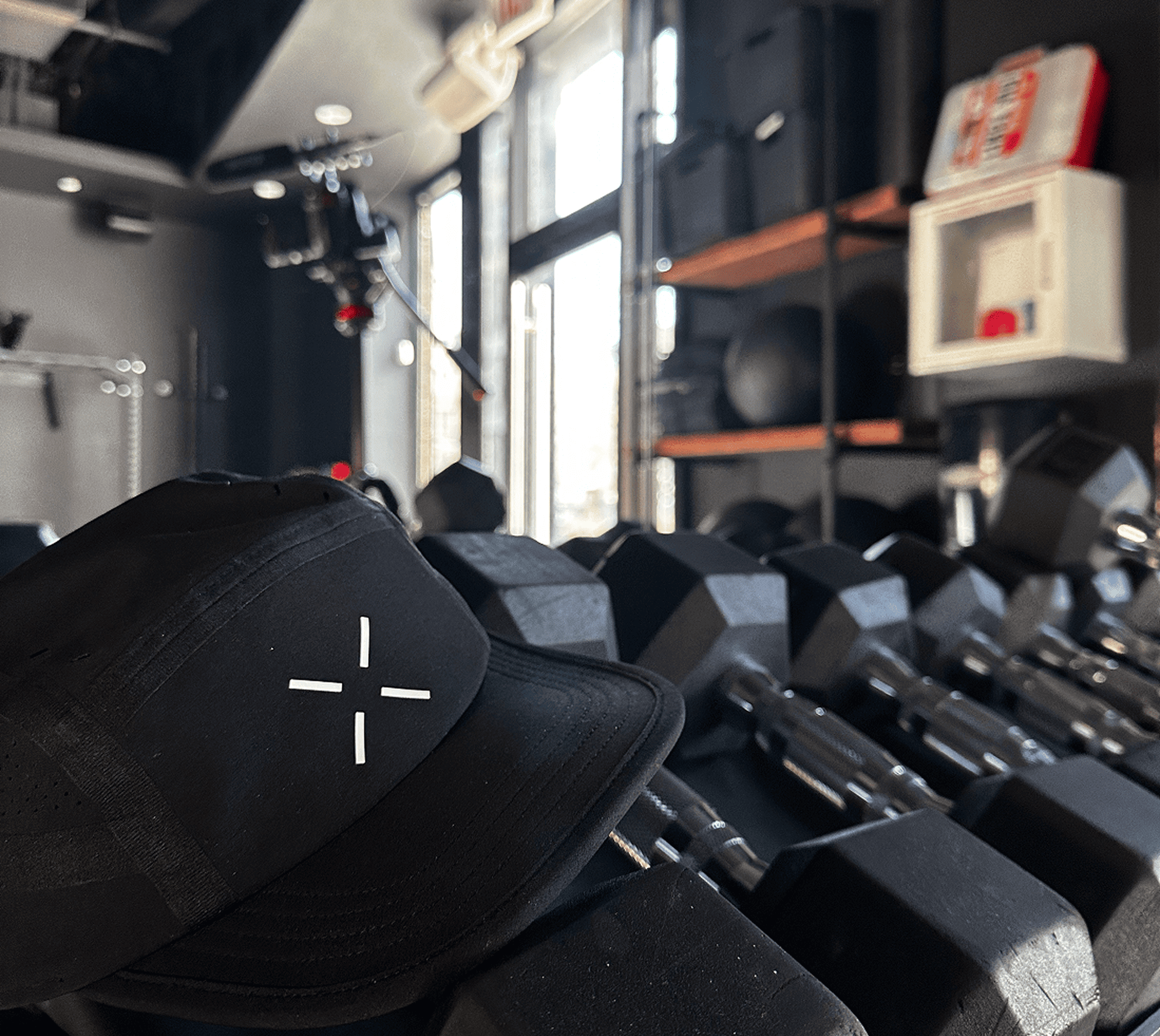 GenovaWebArt-case-study-Ten-Thousand-mini-gallery-black-cap-in-gym