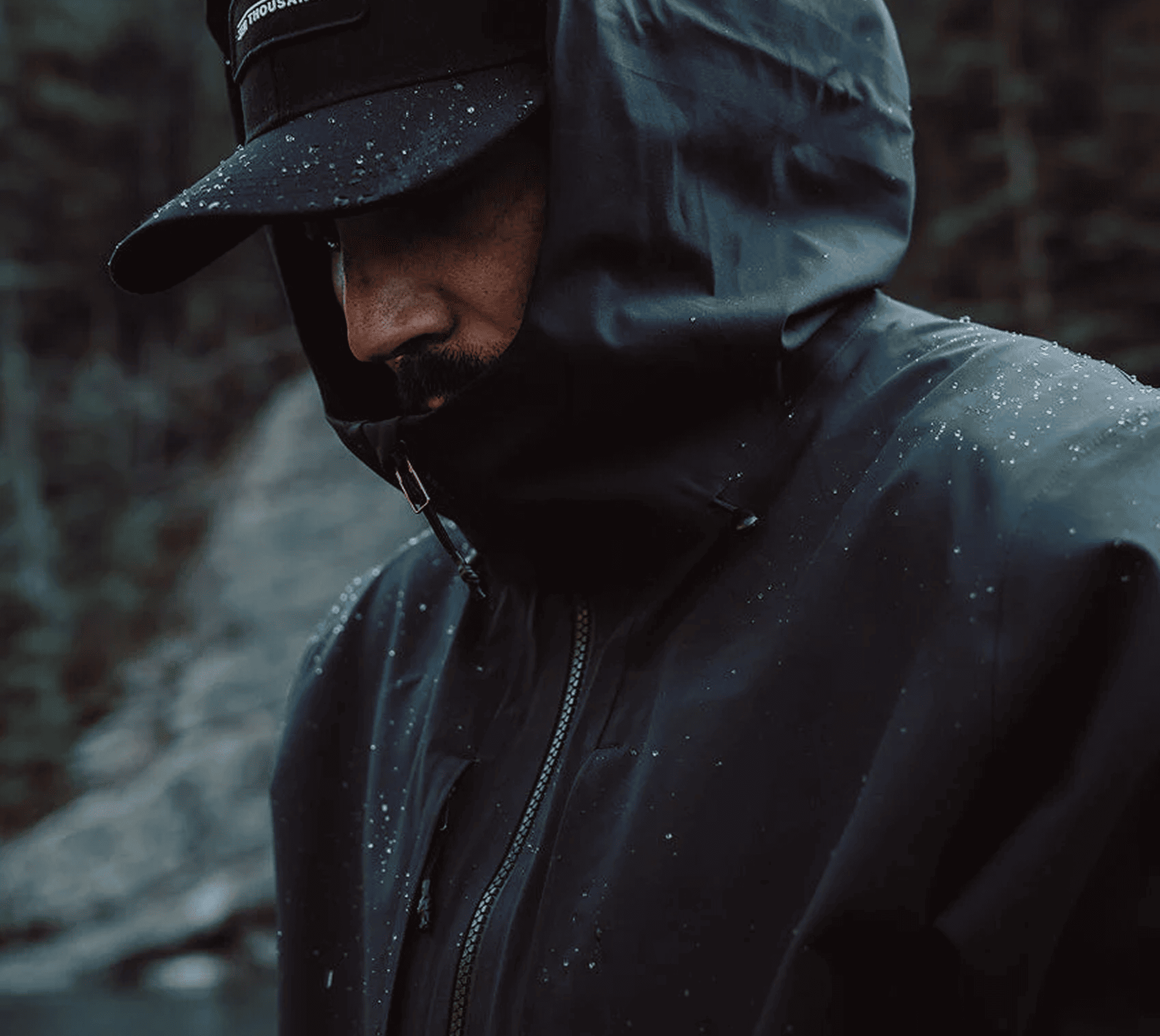 GenovaWebArt-case-study-Ten-Thousand-mini-gallery-man-in-black-rainjacket
